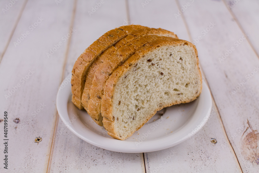 a sliced bread on a wooden table