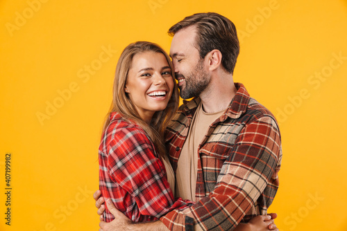 Beautiful happy couple hugging and smiling at each other