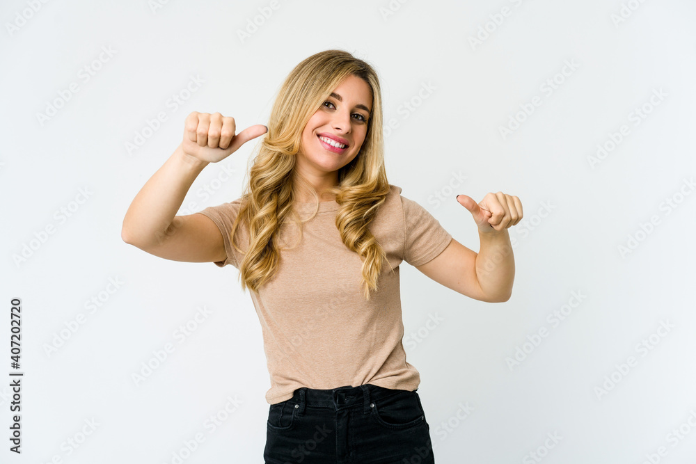 Young caucasian blonde woman raising both thumbs up, smiling and confident. Young caucasian blonde woman raising both thumbs up, smiling and confident.