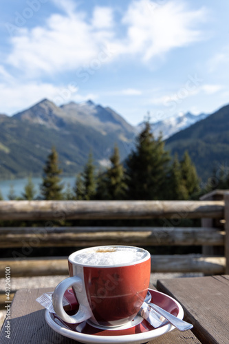 A cup of cappuccino drink before exploring the beautiful natural moutain of austria, durlsaboden