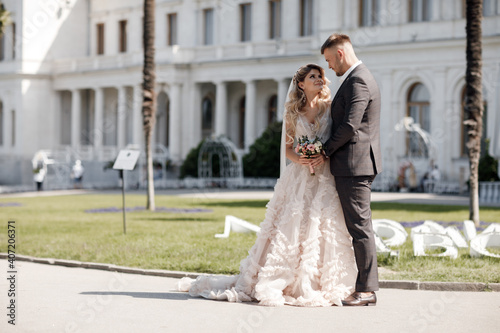 happy bride in luxury dress and groom, wedding love emotions, fashion style