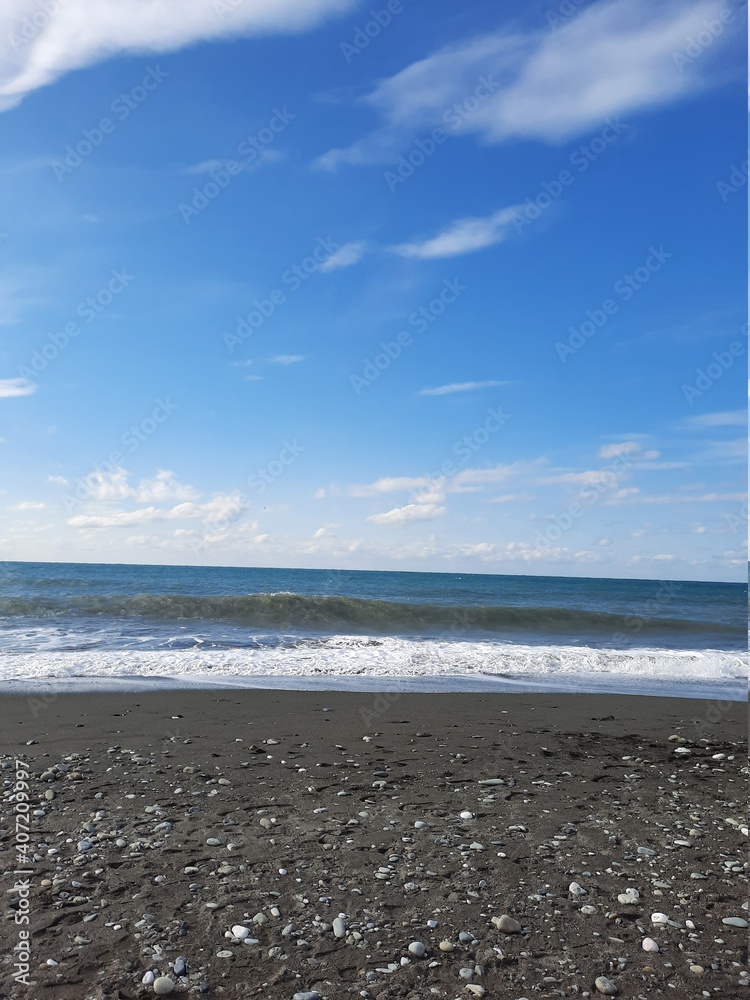 snowy beach near the sea