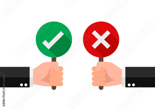 Hand hold signboard green check mark and red cross mark