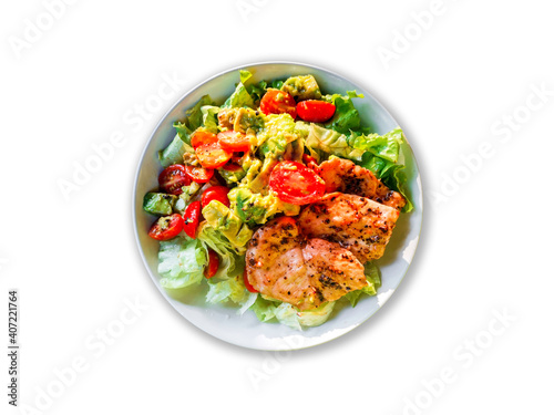 Clean food good health concept. Flat lay of roasted chicken with black pepper, green oak lettuce, avocado in white plate isolated on white background.