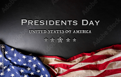 Murais de parede Happy presidents day concept with flag of the United States on black wooden background