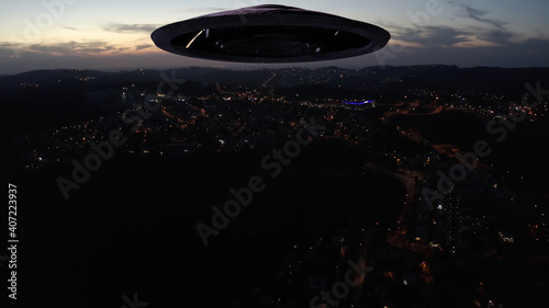 Large Alien spaceship sacuer ufo silhouette over city at sunset,
, Drone view over Jerusalem with Large flying Sacuer Shadow silhouette, visual effect element, invasion sci fi concept

