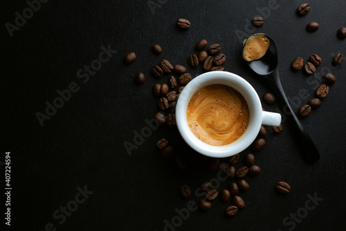 Espresso served in cup on dark