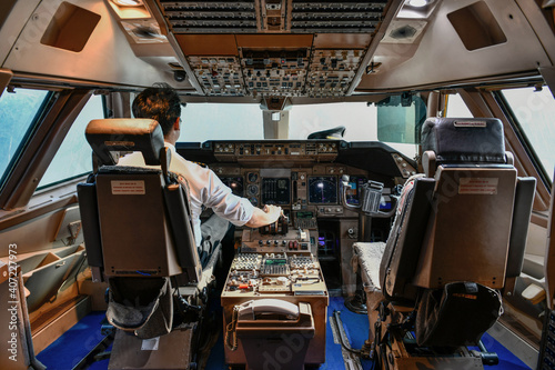 Airline pilot work in the cockpit