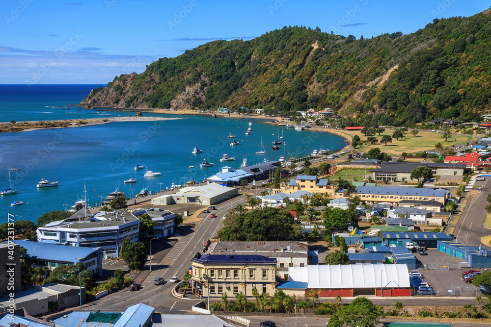 The coastal town of Whakatane in the Bay of Plenty, New Zealand. Many small leisure craft are in the harbour