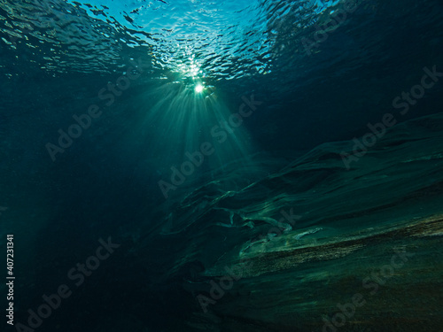 Sunlight dips into the river bed