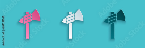Paper cut Native american tomahawk axe icon isolated on blue background. Paper art style. Vector.