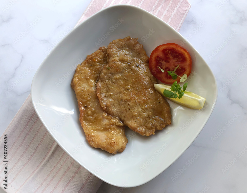 Turkey Escalope, also known als natural schnitzel with gravy and fresh lemon. Turkey Escalope, also known als natural schnitzel with gravy and fresh lemon.