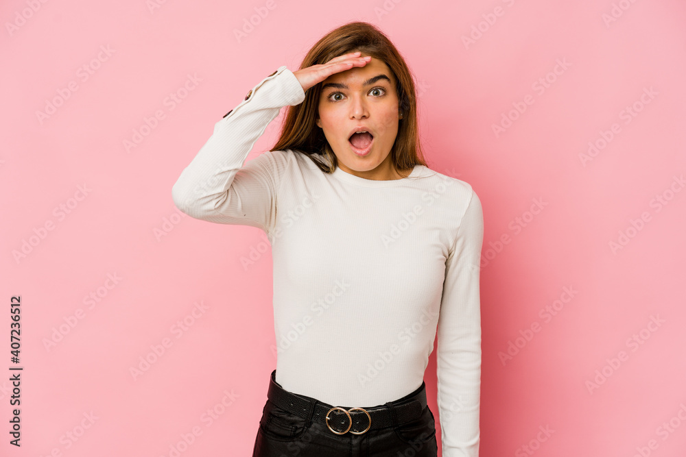 Young skinny caucasian teenager girl shouts loud, keeps eyes opened and hands tense. Young skinny caucasian teenager girl shouts loud, keeps eyes opened and hands tense.