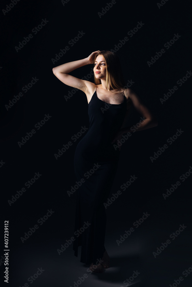 silhouette profile studio portrait of young beautiful fashion mo