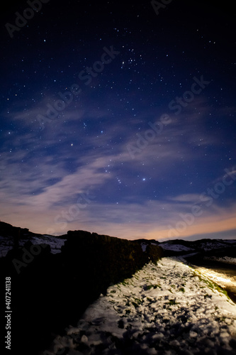 night sky in snowy mountains 