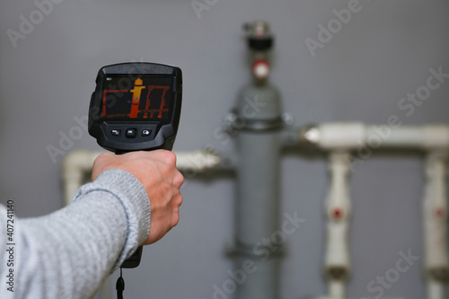 Thermal imager camera inspection. Recognition of the temperature of the heating system during construction and planning. Scanning at a distance without touching.