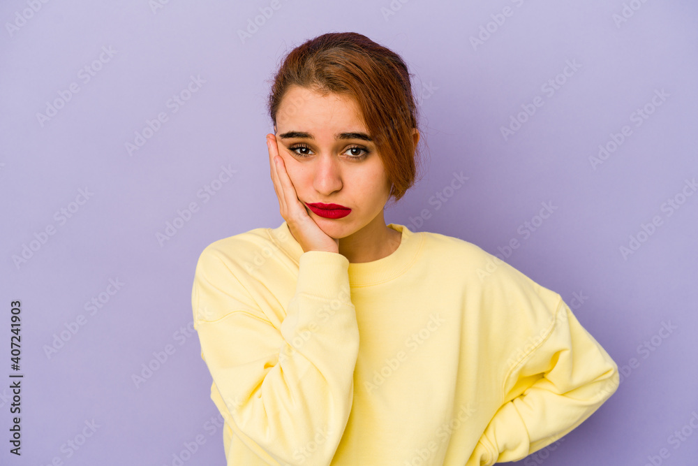 Young arab mixed race woman who feels sad and pensive, looking at copy space. Young arab mixed race woman who feels sad and pensive, looking at copy space.