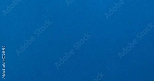 Gray circular puzzles, pieces are disassembling on blue background. Empty template for presentation. Finishing, completion of work task. Successful achievement of goal. Decision, solution found.