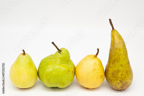 four pears on a white background