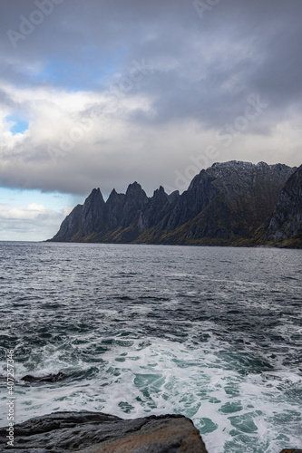 Mountains of Senja surrounded by water in north Norway © Fridimedia