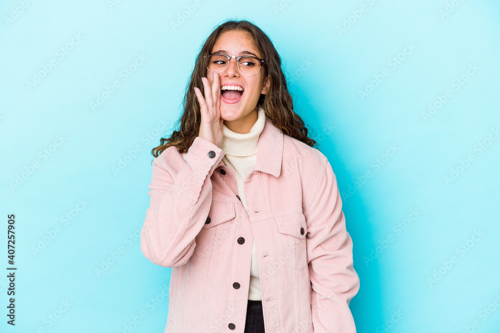 Young caucasian curly hair woman isolated shouting excited to front. Young caucasian curly hair woman isolated shouting excited to front.