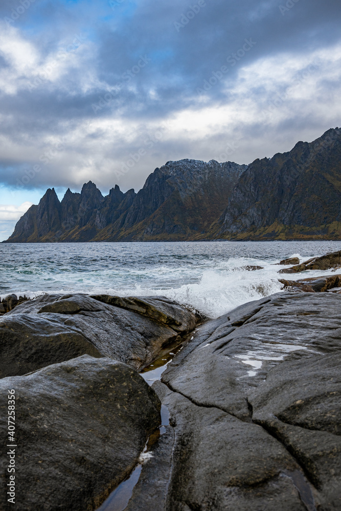 Mountains of Senja surrounded by water in north Norway Mountains of Senja surrounded by water in north Norway