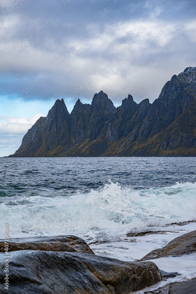 Mountains of Senja surrounded by water in north Norway Mountains of Senja surrounded by water in north Norway