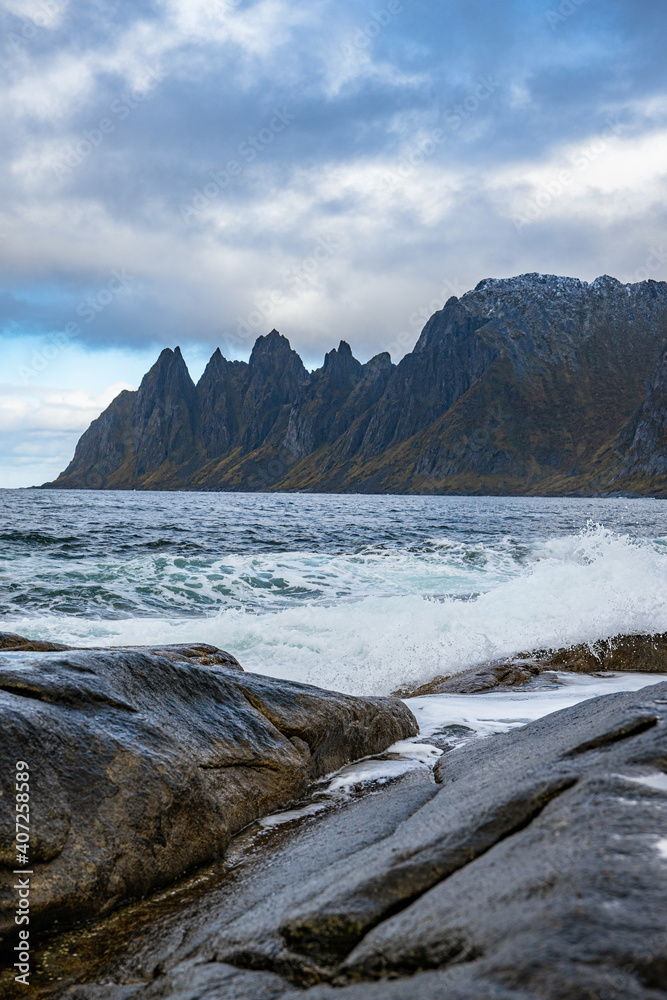 Mountains of Senja surrounded by water in north Norway