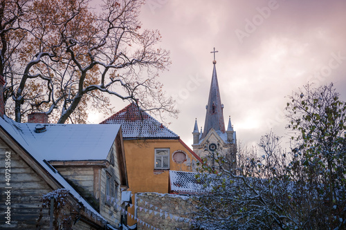 Fototapeta Naklejka Na Ścianę i Meble -  View of the Church of St. John from the old streets of the small town of Cesis. Latvia