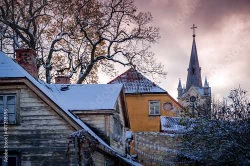 Fototapeta Naklejka Na Ścianę i Meble -  View of the Church of St. John from the old streets of the small town of Cesis. Latvia