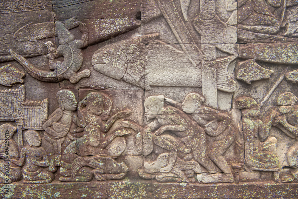  Bayon the central temple of Angkor Thom, late 12th century. Bas-relief. It rains in the rainy season. (Cambodia, 04.10. 2019)