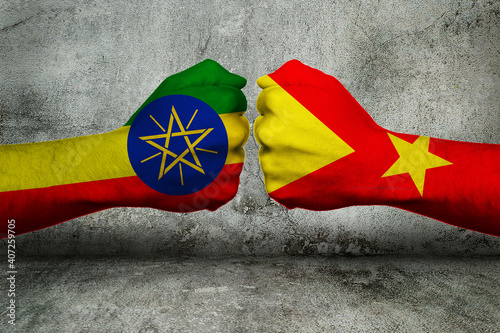 3D-Illustration of a Concept of the Conflict between the Government of Ethiopia and the Tigray Region with two opposing fists in front of a wall. 3D-Rendering