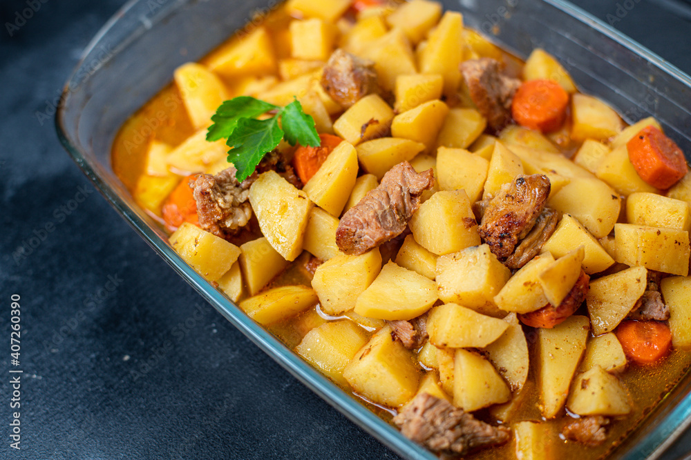 goulash meat with potatoes stewed vegetables and pork on the table for healthy meal snack outdoor top view copy space for text food background rustic image goulash meat with potatoes stewed vegetables and pork on the table for healthy meal snack outdoor top view copy space for text food background rustic image
