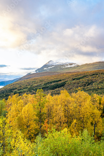 Snow mountains with a cloudy sky in north Norway