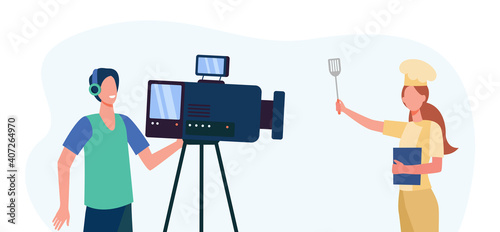 Cooking blogger taking video workshop