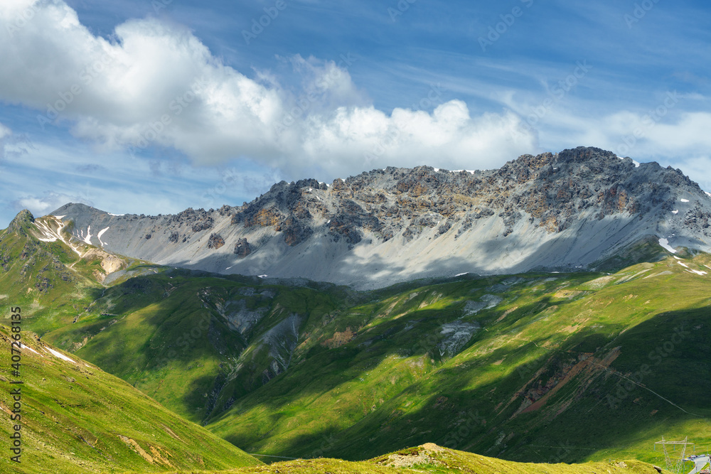 Fototapeta premium Mountain landscape along the road to Stelvio pass (Lombardy) at summer