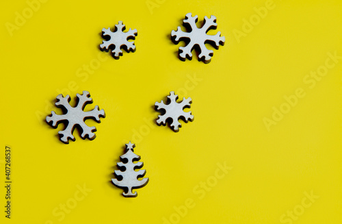 details of wooden puzzles on a bright yellow background