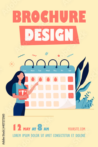 Woman checking menstruation calendar