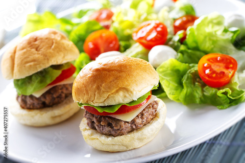 Mini Burgers with Side Salad. High quality photo.
