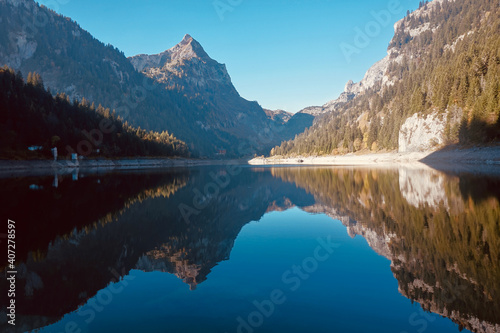 Gorgeous blue Lac de Taney, Valais, Switzerland. Turquoise Swiss lake. 