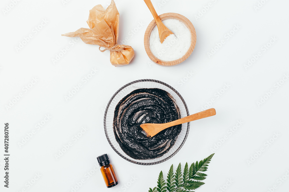 Top view of homemade black clay and sea salt body scrub Top view of homemade black clay and sea salt body scrub