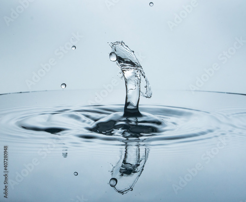 Freeze water liquid drop splash on pure background
