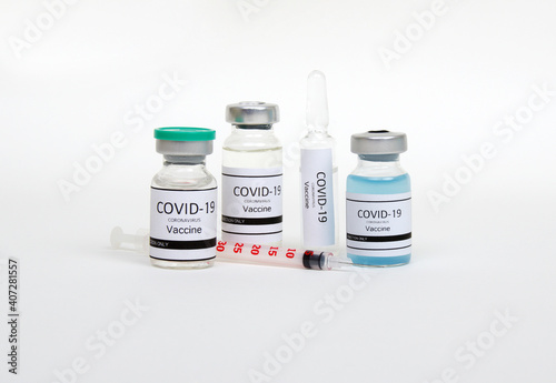 Vaccine bottles isolated on white.