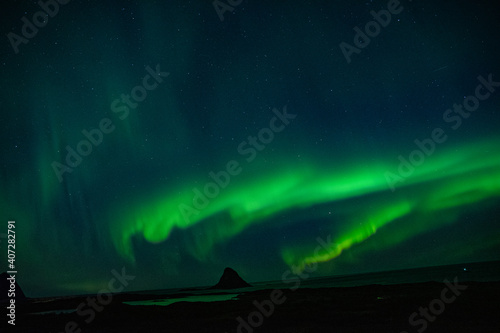 strong northern lights  aurora borealis  in the norwegian wilderness