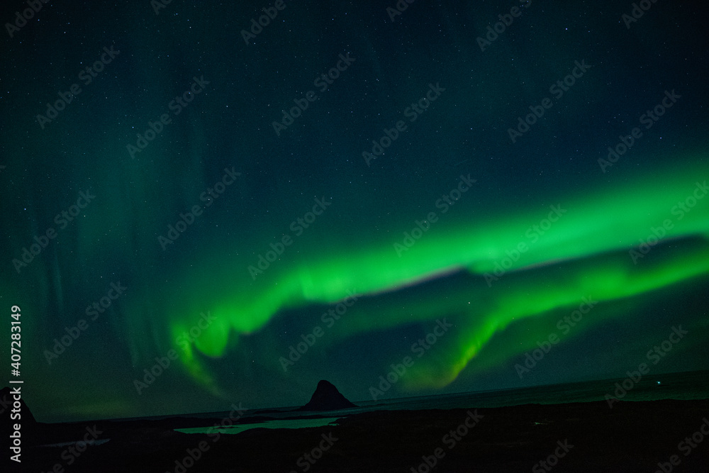 strong northern lights (aurora borealis) in the norwegian wilderness