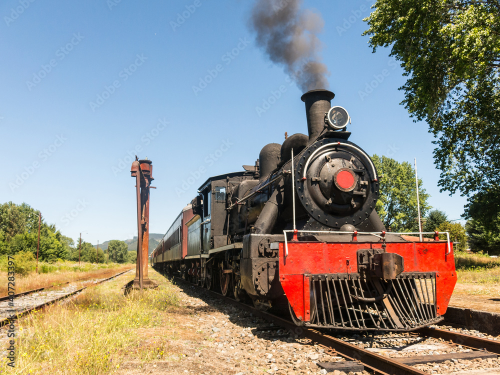 Obraz premium Tourist train called Valdiviano that runs from Valdivia to Antilhue with a 1913 North British locomotive type 57. Los Rios Region, in southern Chile.