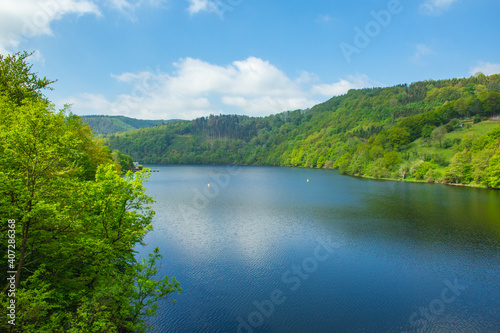 Rursee at Eifel National Park, Germany. Scenic view of lake Rursee and surrounded green hills in North Rhine-Westphalia