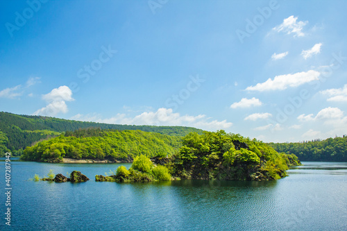 Lake Urft at Eifel National Park, Germany. Scenic view of lake and river Urft and surrounded lush green landscape in North Rhine-Westphalia