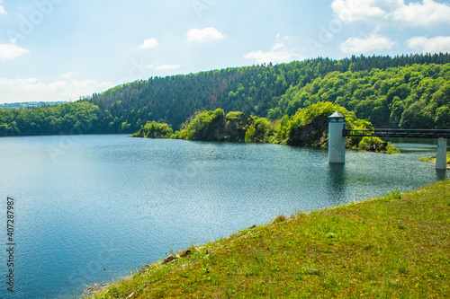 Lake Urft at Eifel National Park, Germany. Scenic view of lake and river Urft and surrounded lush green landscape in North Rhine-Westphalia