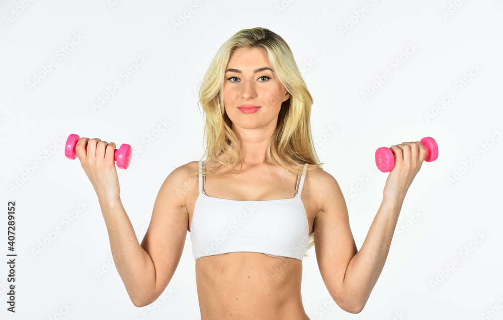 Sport training. Healthy body. Girl exercising. Motivation. Feel yourself better. Woman with perfect body exercising. Great shape. Female fitness girl lifting dumbbell. Girl in gym with dumbbells Sport training. Healthy body. Girl exercising. Motivation. Feel yourself better. Woman with perfect body exercising. Great shape. Female fitness girl lifting dumbbell. Girl in gym with dumbbells